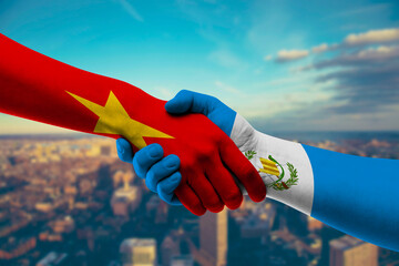 Shaking hands Vietnam and Guatemala