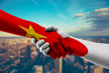 Shaking hands Vietnam and Japan
