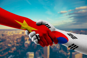 Shaking hands Vietnam and South Korea