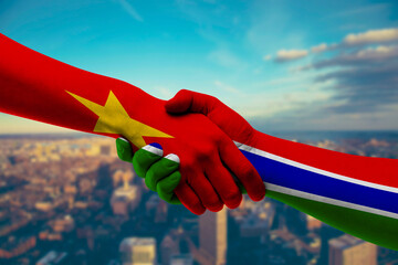 Shaking hands Vietnam and The Gambia