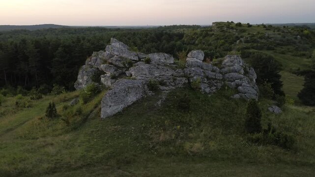 Aerial drone flight over Limestone Rock Ner Olsztyn, Poland