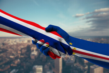 Shaking hands Thailand and Cabo Verde