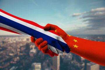 Shaking hands Thailand and China