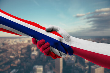 Shaking hands Thailand and Poland