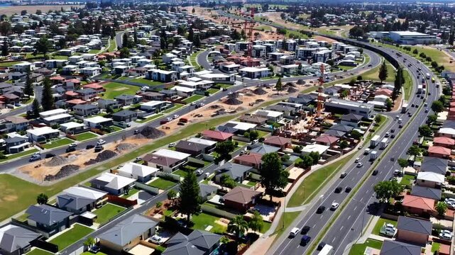 Aerial Perspective of Major Highway Bordering Newly Developed Residential Subdivisions and Communities
