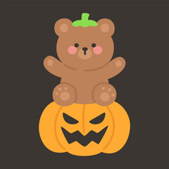 Cute Brown Bear Sitting on Top of Jack O Lantern Pumpkin Halloween
