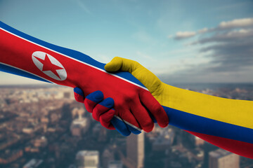Shaking hands Northkorea and_Colombia
