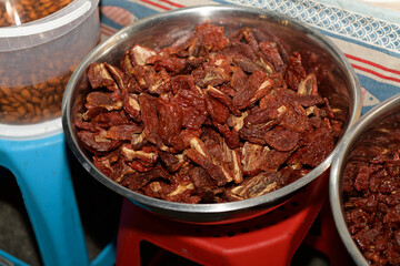 Dried Tomatoes on Display at a Local Market During Evening Hours