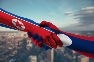 Shaking hands Northkorea and_Laos