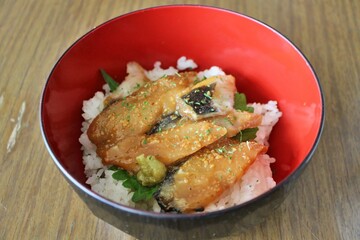Japanese cuisine: marinated sawara (Japanese Spanish mackerel) rice bowl in Tokyo, Japan