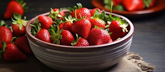 bowl of fresh ripe juicy strawberries, closeup photography, dark moody lighting, high contrast, detailed textures, vibrant colors, realistic, glossy, macro shot
