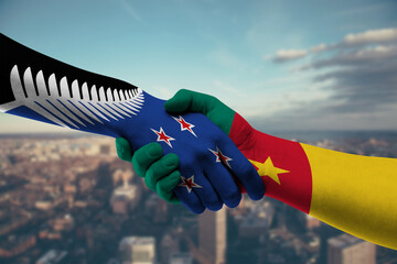 Shaking hands New Zealand and_Cameroon
