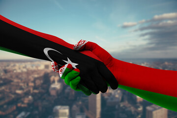 Shaking hands Libya and Belarus