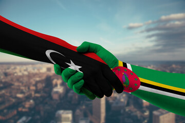 Shaking hands Libya and Dominica