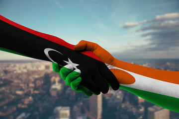 Shaking hands Libya and Niger