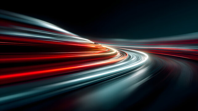 Blurred lines of fast-moving red and white lights streak across a city highway at night, capturing the abstract motion of urban traffic