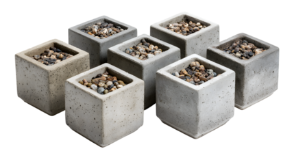 Modern concrete planters filled with decorative pebbles add stylish natural charm to any contemporary space isolated on white background