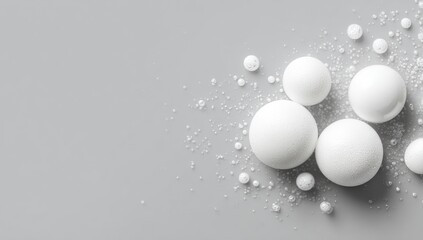Abstract composition of white spheres on a gray background