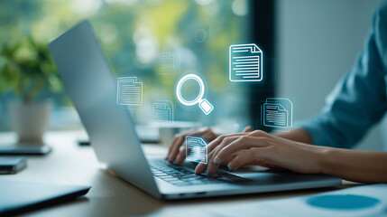 Fototapeta premium Businessman using a computer to document management concept, online documentation database and digital file storage system/software, records keeping, database technology, file access, doc sharing.