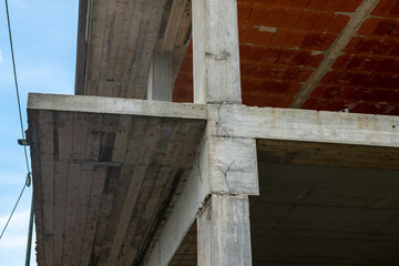 Construction details in reinforced concrete construction with exposed pillars and slabs. Architectural elements that define the basic structure of the building with floor connection points