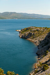 Rocky Coastline Overlooking Calm Waters