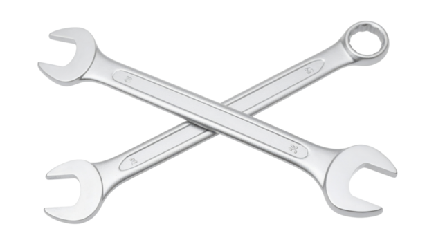 Two crossed chrome combination wrenches - polished steel hand tools with open and box ends for tightening and loosening nuts and bolts.