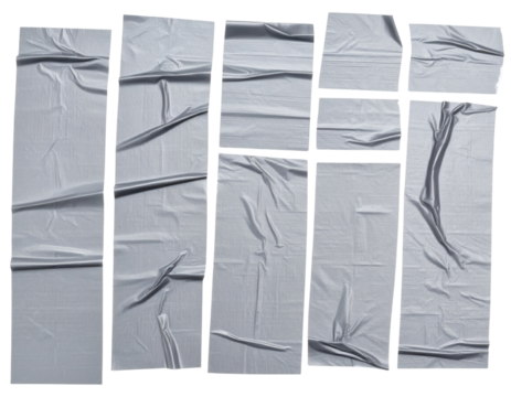 Ten narrow rectangular wrinkled paper sheets with pronounced creases, folds, and subtle surface texture.