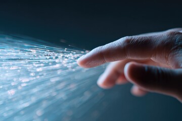 Finger reaching out, creating stream of sparkling light particle