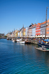 Colorful Waterfront Buildings and Boats in Nyhavn, Copenhagen - May 6, 2023