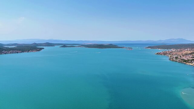 Drone view of Ayvalik in Balikesir in Turkiye. Magnificent views of the turquoise sea and islands.