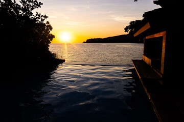 Sun setting out on West Philippines Sea from resort jacuzzi Bataan Philippines 2024 