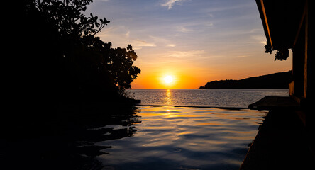 Sun setting out on West Philippines Sea at resort in Bataan Philippines 2024 