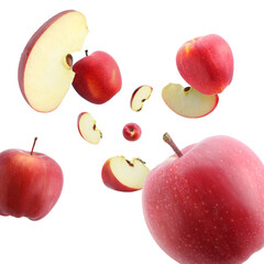 Fresh red apples swirling in air against white background