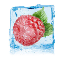 Ripe raspberry with green leaf in ice cube on white background