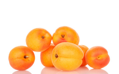 Ripe organic apricots isolated on white background, macro.
