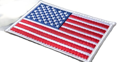 Fototapeta premium Embroidered american flag patch a detailed close up of the stars and stripes emblematic of patriotism and national pride