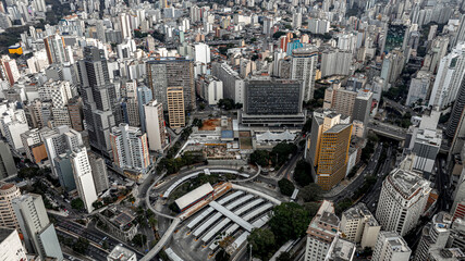 Aerial drone view of São Paulo downtown, Brazil, showing bus terminal, high-rise buildings, urban...