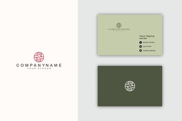 Modern Business Card Design with Circular Emblem Logo and Clean Layout.