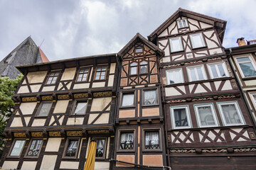 Traditional half timbered houses with decorative facades and multiple windows in Hann Münden