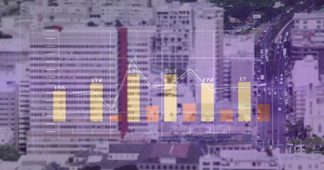 Displaying translucent bar chart and line graph over aerial city street with grid, towers, vehicles