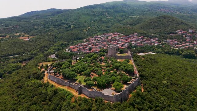 Aerial Drone Pan Out Shot Of Historic Byzantine Castle Of Platamon, Platamon, Pieria, Macedonia, Greece On A Sunny Summer Afternoon.