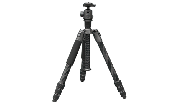 Gray carbon fiber tripod, head and legs extended, isolated on black background