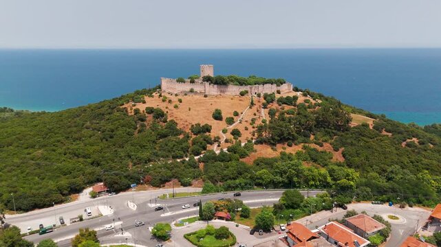 Aerial Drone Shot Of Historic Byzantine Castle of Platamon On Aegean Sea Coastline, Pieria, Macedonia, Greece On A Sunny Afternoon.