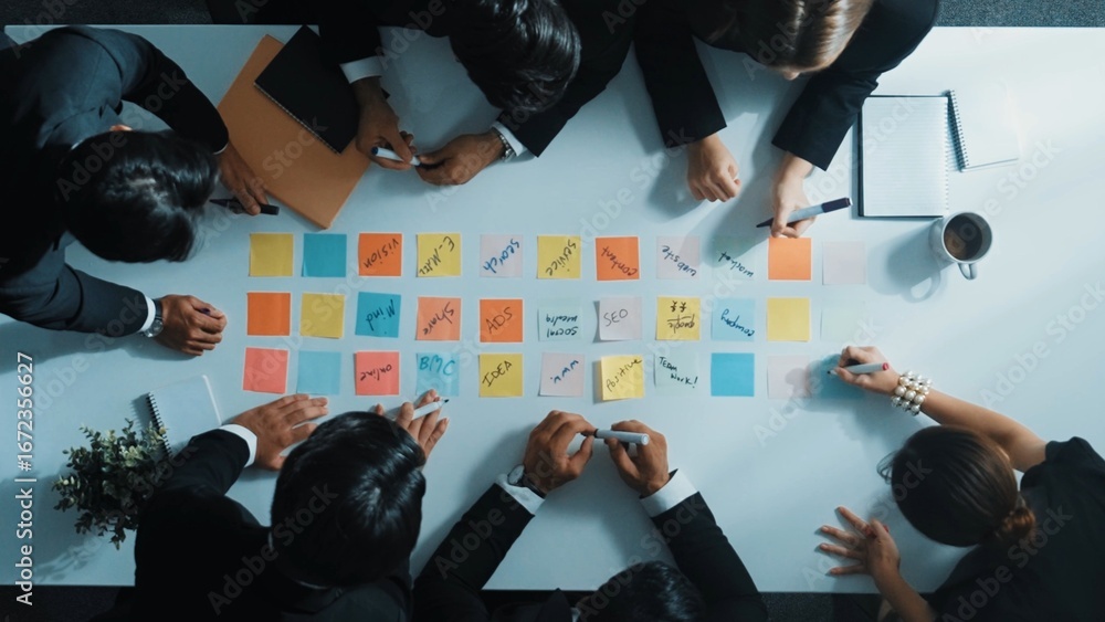 Poster smart cooperate business people writing and brainstorming business idea by using sticky notes. top v