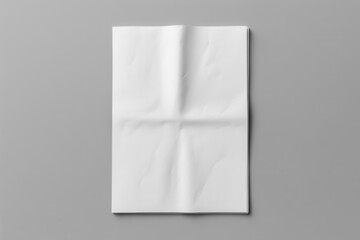 Obraz na płótnie Canvas Folded newspaper mockup on gray background
