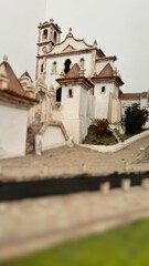 Miniature model of a beautiful traditional Portuguese church, capturing its classic architecture and historical charm with a unique tilt-shift perspective