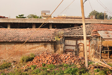 farm labor house in village area of gujarat india. with brick roof wooden pillars. small...