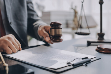 Lawyer explained to the client about the law that must be brought against the court case.