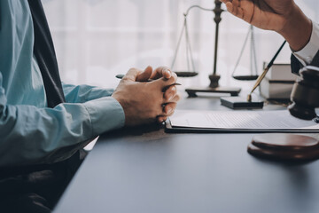 Lawyer explained to the client about the law that must be brought against the court case.