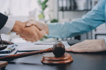 Lawyer explained to the client about the law that must be brought against the court case.